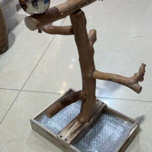 Bird stand made from a Java tree, designed for pet birds, particularly parrots and macaws. It provides a natural and stimulating environment for birds to play, exercise, and feed.